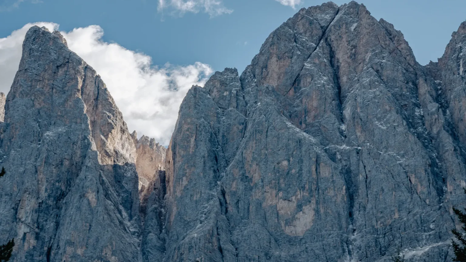 Rocky Dolomite peaks under a blue sky in northern Italy